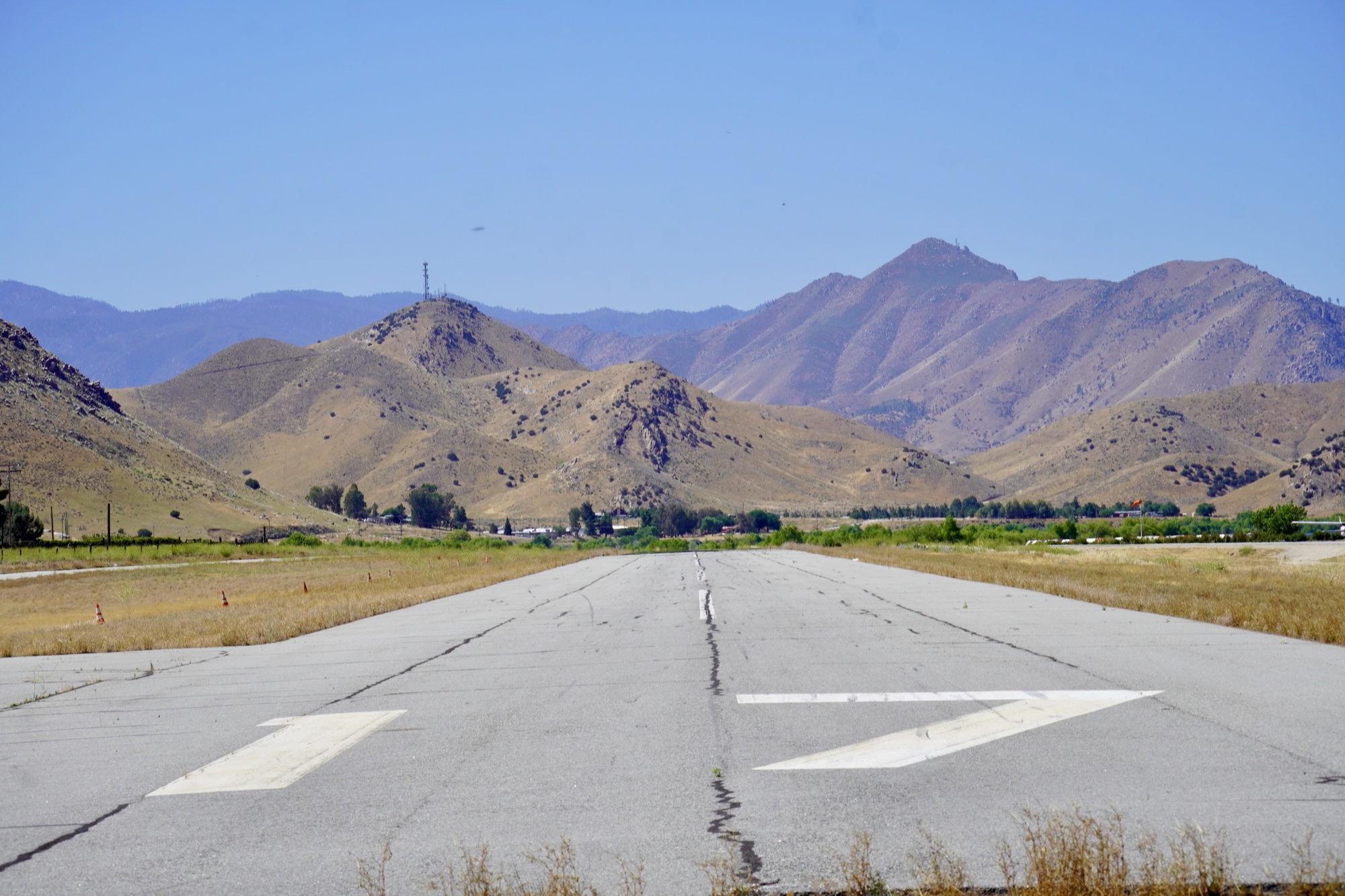 Kern Valley Flyout Looking down the runway at Kern Valley Airport toward the surrounding hills.
